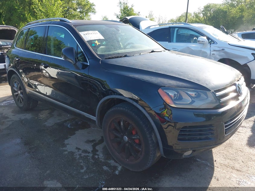 2011 Volkswagen Touareg VIN WVGFF9BP1BD003598 IAAI salvage auction — HAIL, Salvage (Kansas), sold $600 on 2026-07-08 (photo 1)