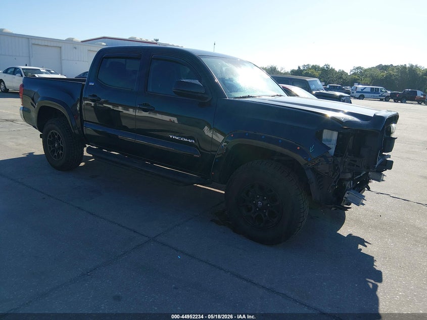2021 Toyota Tacoma VIN 5TFAZ5CN9MX100013 IAAI salvage auction — FRONT END, Salvage Title, sold $8,300 on 2026-07-12 (photo 1)