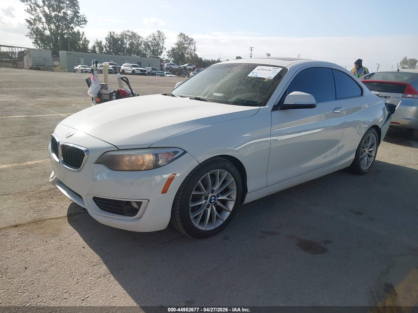 2014 BMW 2er VIN WBA1F5C50EVV98864 IAAI salvage auction — REAR END, Clear (Arkansas), sold $1,575 on 2026-08-12 (photo 2)