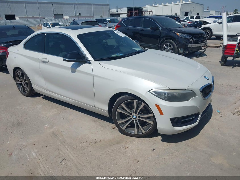 2014 BMW 2er VIN WBA1F5C59EV255972 IAAI salvage auction — WATER/FLOOD, Original (Texas), sold $2,100 on 2026-07-23 (photo 1)