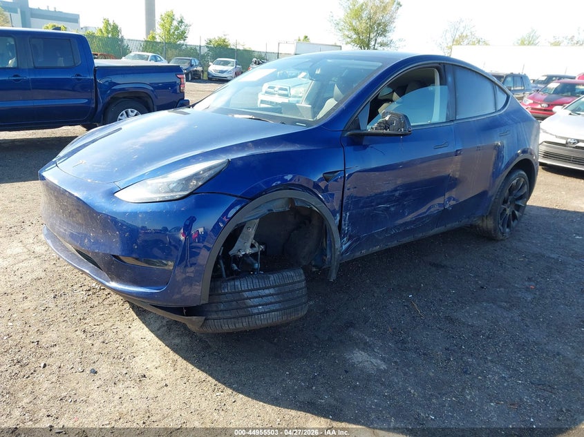 2024 Tesla Model y VIN 7SAYGDEE3RA218314 IAAI salvage auction — LEFT FRONT, Salvage Title, sold $12,500 on 2026-07-09 (photo 2)