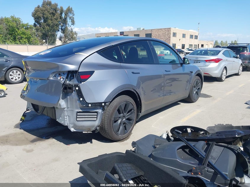 2025 Tesla Model y VIN 7SAYGDED6SF319914 IAAI salvage auction — REAR END, Salvage Title, sold $11,250 on 2026-07-23 (photo 4)