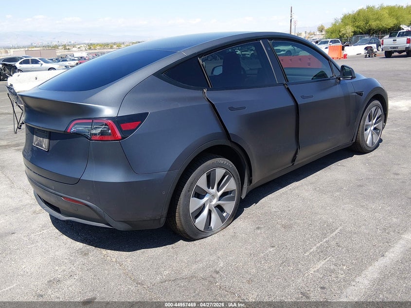 2021 Tesla Model y VIN 5YJYGDEE0MF274994 IAAI salvage auction — LEFT SIDE, Salvage (Nevada), sold $7,975 on 2026-07-09 (photo 4)