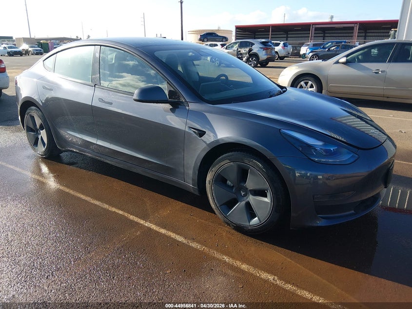2023 Tesla Model 3 VIN 5YJ3E1EA5PF669172 IAAI salvage auction — LEFT REAR, Clear (Hawaii), sold $10,050 on 2026-07-07 (photo 1)