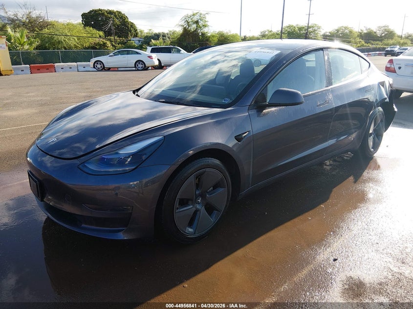 2023 Tesla Model 3 VIN 5YJ3E1EA5PF669172 IAAI salvage auction — LEFT REAR, Clear (Hawaii), sold $10,050 on 2026-07-07 (photo 2)