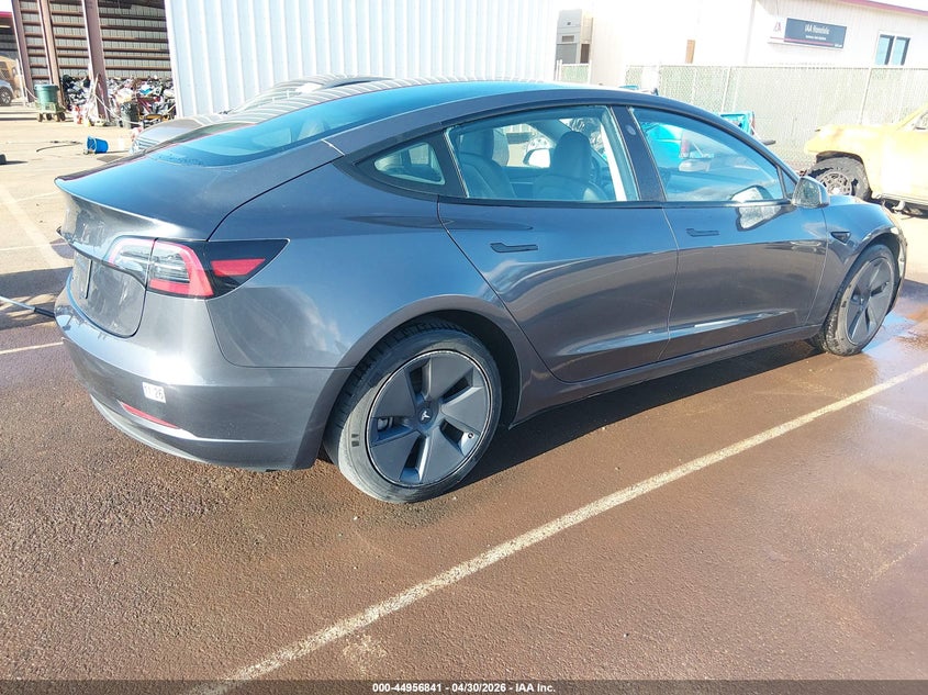 2023 Tesla Model 3 VIN 5YJ3E1EA5PF669172 IAAI salvage auction — LEFT REAR, Clear (Hawaii), sold $10,050 on 2026-07-07 (photo 4)
