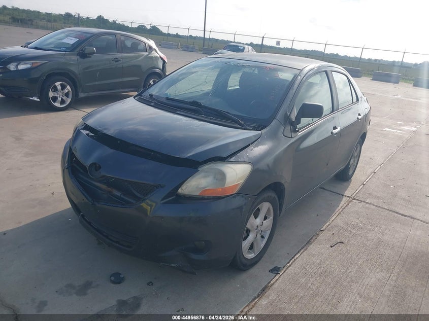 2007 Toyota Yaris VIN JTDBT923471057737 IAAI salvage auction — FRONT & REAR, Original (Texas), sold $625 on 2026-07-17 (photo 2)