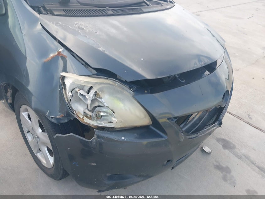 2007 Toyota Yaris VIN JTDBT923471057737 IAAI salvage auction — FRONT & REAR, Original (Texas), sold $625 on 2026-07-17 (photo 6)