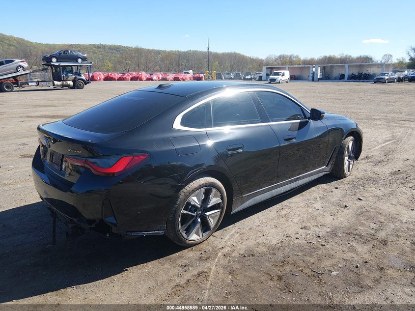 2025 BMW I4 VIN WBY43HD01SFU31057 IAAI salvage auction — REAR END, Salvage (New Jersey), sold $20,500 on 2026-08-20 (photo 4)