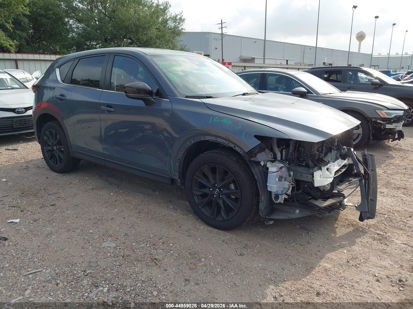 2023 Mazda Cx-5 VIN JM3KFBCM4P0123979 IAAI salvage auction — FRONT END, Salvage Title, sold $9,750 on 2026-07-23 (photo 1)