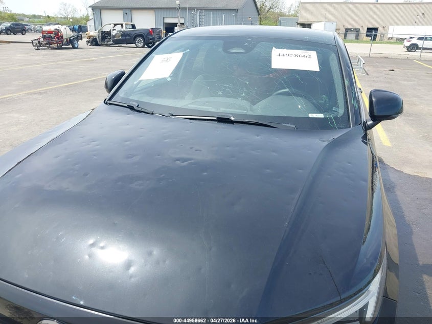 2024 Volvo C40 VIN YV4ER3GL0R2107416 IAAI salvage auction — HAIL, Salvage Title, sold $12,400 on 2026-07-28 (photo 6)