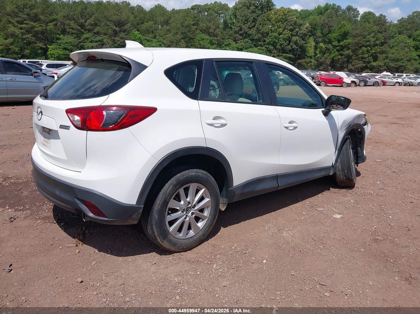 2014 Mazda Cx-5 VIN JM3KE2BE2E0398518 IAAI salvage auction — RIGHT FRONT, Salvage Title, sold $2,075 on 2026-07-15 (photo 4)