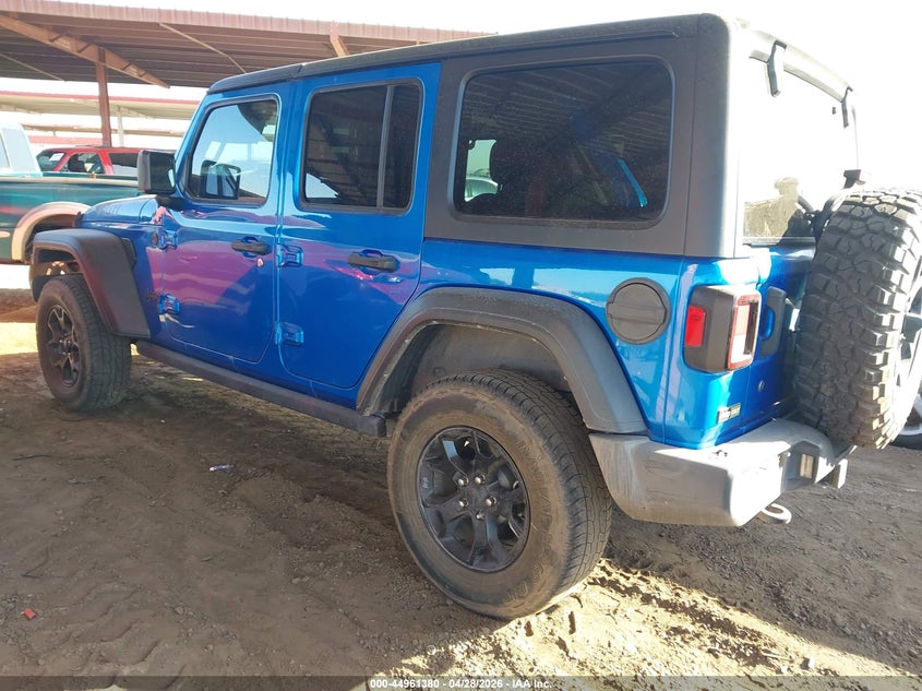 2021 Jeep Wrangler / VIN 1C4HJXDG3MW720637 IAAI salvage auction — UNKNOWN, Salvage Title, sold $7,100 on 2026-08-13 (photo 3)