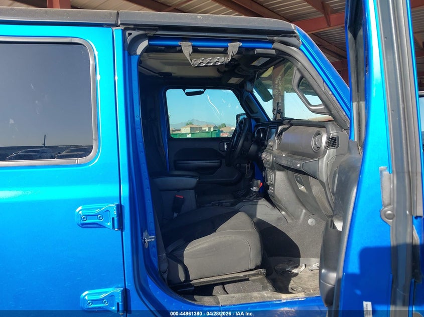 2021 Jeep Wrangler / VIN 1C4HJXDG3MW720637 IAAI salvage auction — UNKNOWN, Salvage Title, sold $7,100 on 2026-08-13 (photo 5)