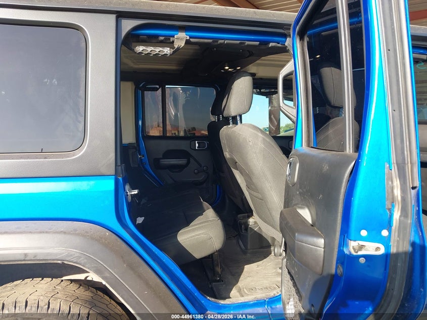 2021 Jeep Wrangler / VIN 1C4HJXDG3MW720637 IAAI salvage auction — UNKNOWN, Salvage Title, sold $7,100 on 2026-08-13 (photo 8)