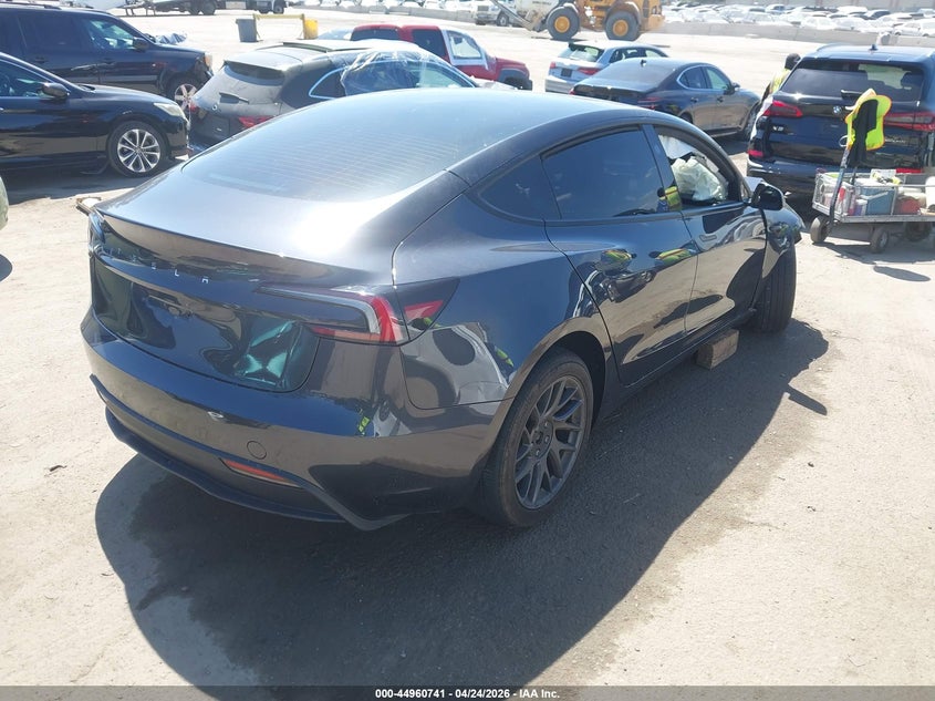 2025 Tesla Model 3 VIN 5YJ3E1EA9SF013033 IAAI salvage auction — RIGHT FRONT, Salvage Title, sold $7,200 on 2026-07-08 (photo 4)