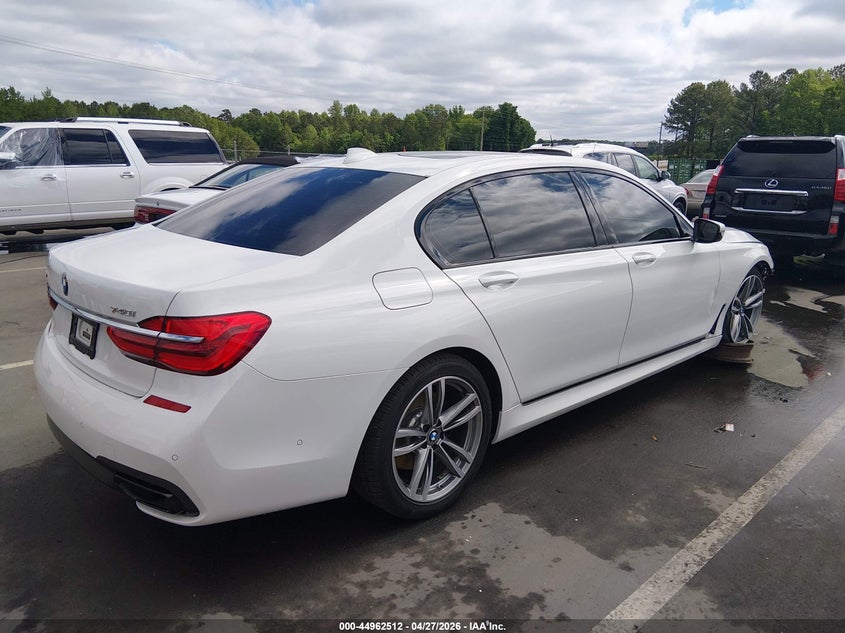 2018 BMW 7er VIN WBA7E4C5XJGV24146 IAAI salvage auction — RIGHT FRONT, Salvage Title, sold $8,000 on 2026-07-08 (photo 4)