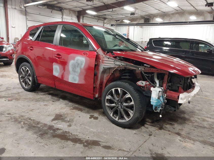 2016 Mazda Cx-5 VIN JM3KE4DY9G0767431 IAAI salvage auction — FRONT END, Junking Certificate (Iowa), sold $1,650 on 2026-07-14 (photo 1)