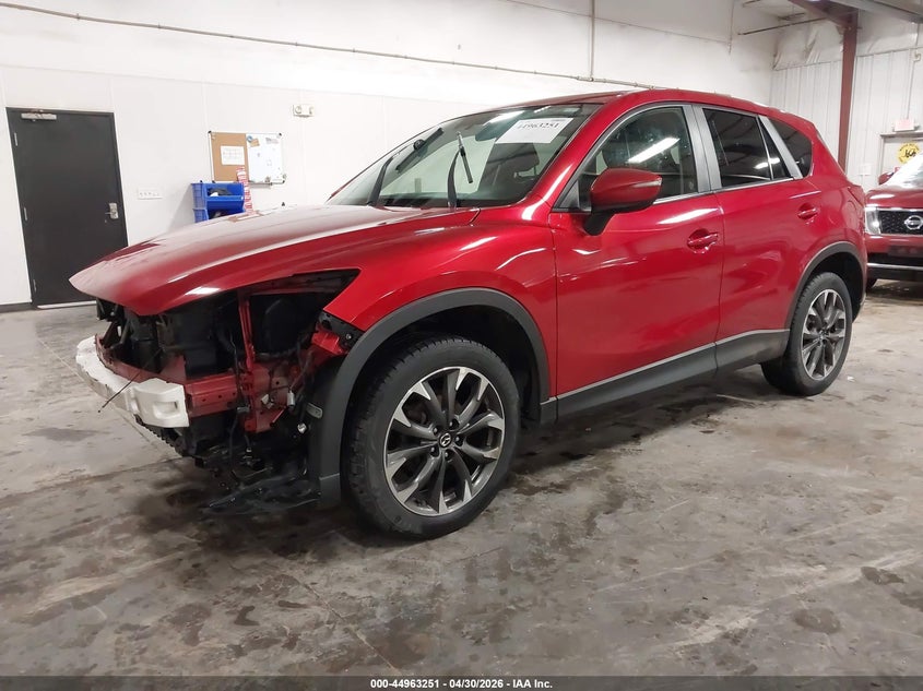 2016 Mazda Cx-5 VIN JM3KE4DY9G0767431 IAAI salvage auction — FRONT END, Junking Certificate (Iowa), sold $1,650 on 2026-07-14 (photo 2)