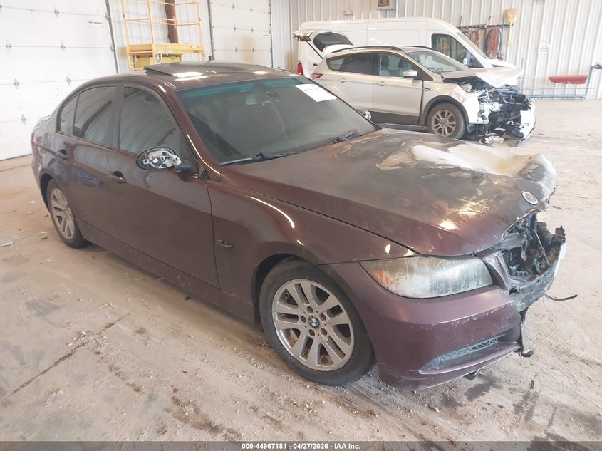 2007 BMW 3 series VIN WBAVA33507KX77687 IAAI salvage auction — Burn Engine, Clear (Michigan), sold $275 on 2026-07-07 (photo 1)
