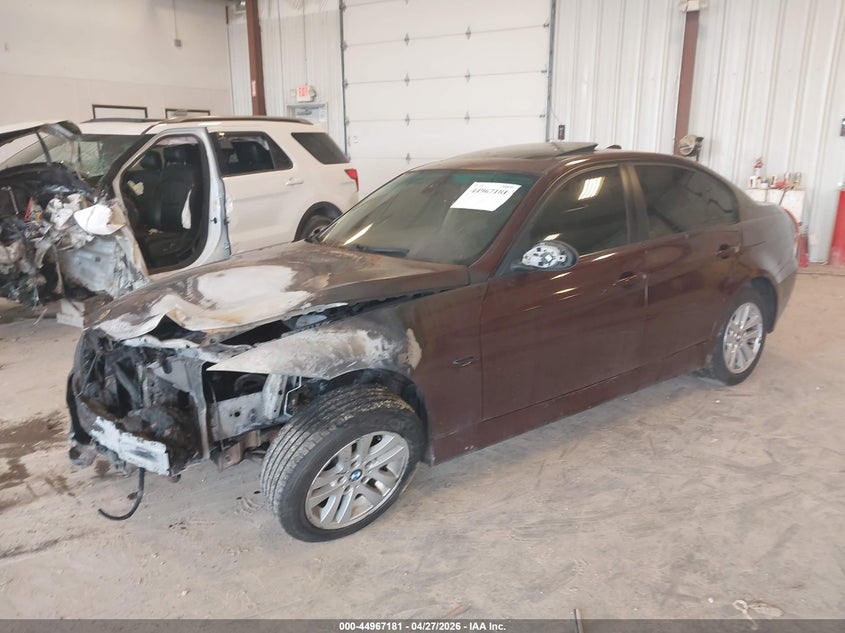2007 BMW 3 series VIN WBAVA33507KX77687 IAAI salvage auction — Burn Engine, Clear (Michigan), sold $275 on 2026-07-07 (photo 2)