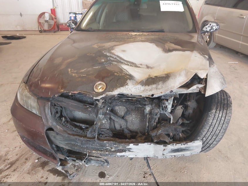 2007 BMW 3 series VIN WBAVA33507KX77687 IAAI salvage auction — Burn Engine, Clear (Michigan), sold $275 on 2026-07-07 (photo 6)