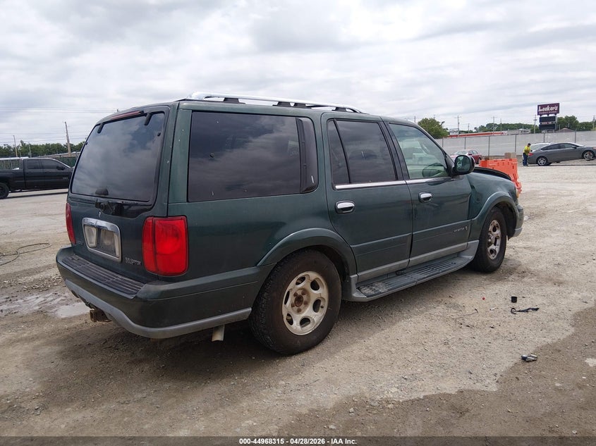 2000 Lincoln Navigator VIN 5LMEU27A1YLJ17710 IAAI salvage auction — LEFT FRONT, Salvage (Kansas), sold $25 on 2026-07-10 (photo 4)