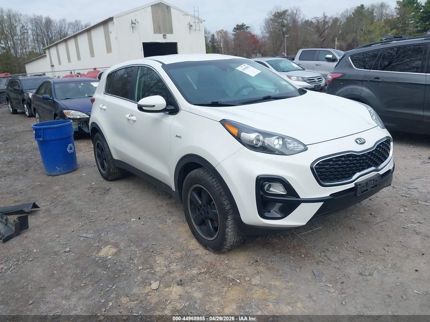 2021 Kia Sportage VIN KNDPMCAC5M7874225 IAAI salvage auction — LEFT SIDE, Mv-907A (New York), sold $2,850 on 2026-07-07 (photo 1)
