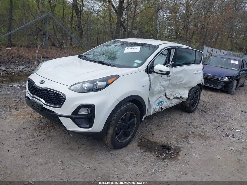 2021 Kia Sportage VIN KNDPMCAC5M7874225 IAAI salvage auction — LEFT SIDE, Mv-907A (New York), sold $2,850 on 2026-07-07 (photo 2)