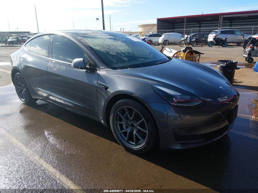 2021 Tesla Model 3 VIN 5YJ3E1EAXMF982066 IAAI salvage auction — UNKNOWN, Salvage (Hawaii), sold $1,550 on 2026-07-21 (photo 1)