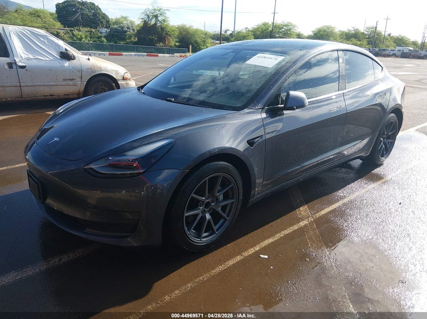 2021 Tesla Model 3 VIN 5YJ3E1EAXMF982066 IAAI salvage auction — UNKNOWN, Salvage (Hawaii), sold $1,550 on 2026-07-21 (photo 2)