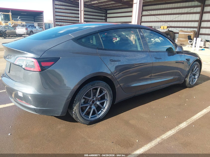 2021 Tesla Model 3 VIN 5YJ3E1EAXMF982066 IAAI salvage auction — UNKNOWN, Salvage (Hawaii), sold $1,550 on 2026-07-21 (photo 4)