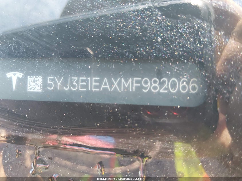 2021 Tesla Model 3 VIN 5YJ3E1EAXMF982066 IAAI salvage auction — UNKNOWN, Salvage (Hawaii), sold $1,550 on 2026-07-21 (photo 9)