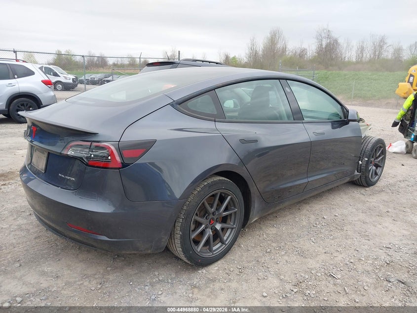 2022 Tesla Model 3 VIN 5YJ3E1EB0NF183844 IAAI salvage auction — FRONT END, Salvage Title, sold $7,400 on 2026-07-08 (photo 4)