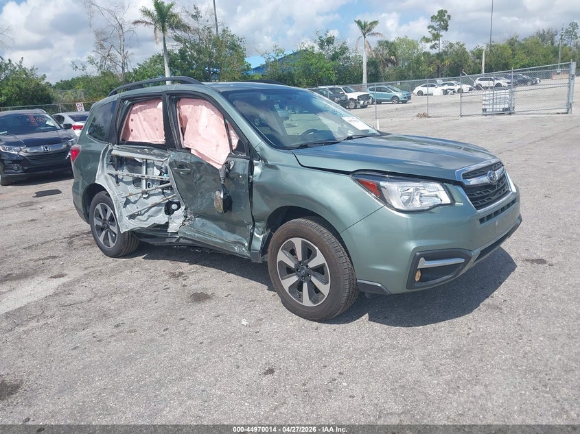 2018 Subaru Forester VIN JF2SJAGC5JH577509 IAAI salvage auction — SIDE, Rebuildable (Florida), sold $375 on 2026-07-20 (photo 1)