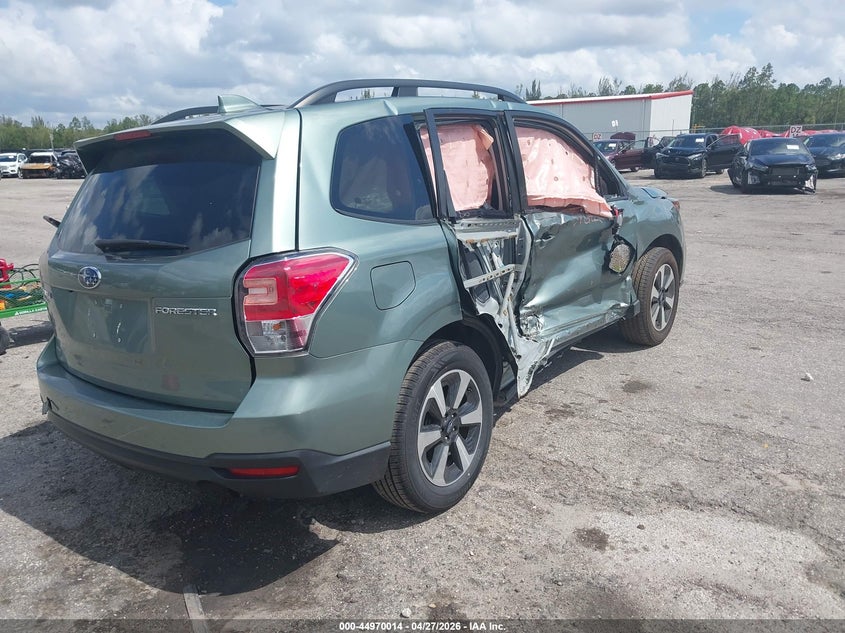 2018 Subaru Forester VIN JF2SJAGC5JH577509 IAAI salvage auction — SIDE, Rebuildable (Florida), sold $375 on 2026-07-20 (photo 4)
