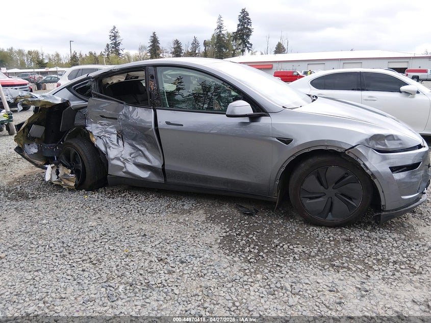2026 Tesla Model y VIN 7SAYGDED6TF391195 IAAI salvage auction — RIGHT SIDE, Salvage Title, sold $11,450 on 2026-07-08 (photo 6)