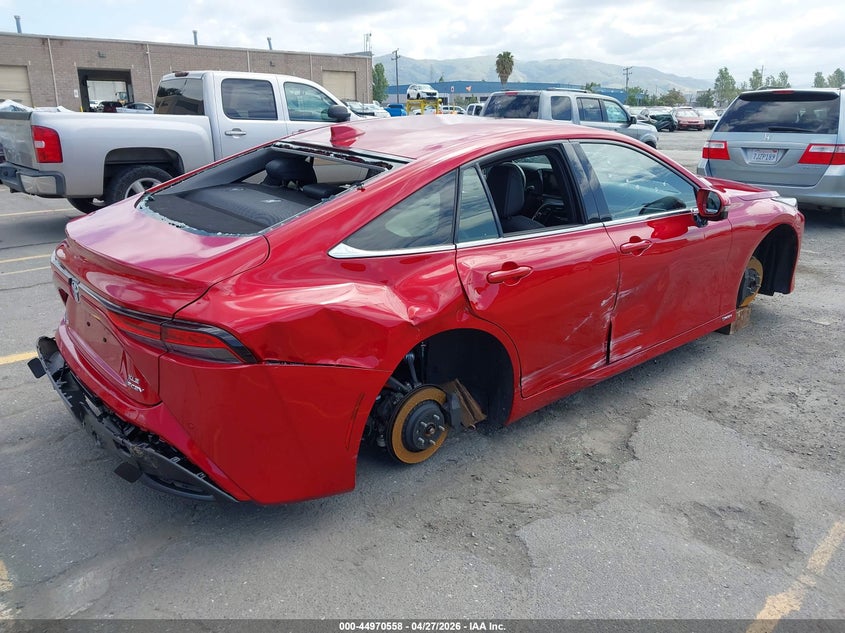 2024 Toyota Mirai VIN JTDAAAAA1RA011580 IAAI salvage auction — RIGHT SIDE, Salvage (California), sold $2,400 on 2026-08-01 (photo 4)