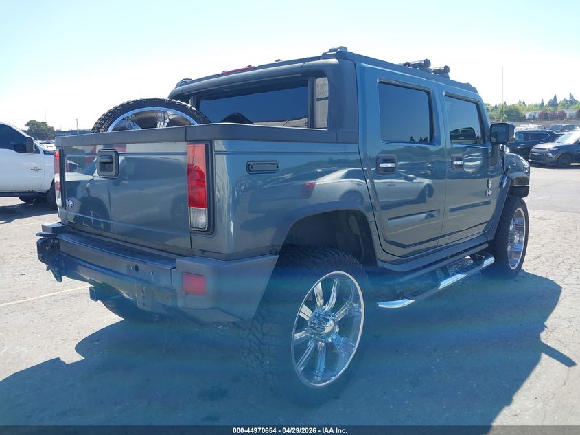 2006 Hummer H2 VIN 5GRGN22U96H120075 IAAI salvage auction — LEFT SIDE, Salvage (Oregon), sold $7,450 on 2026-07-23 (photo 4)