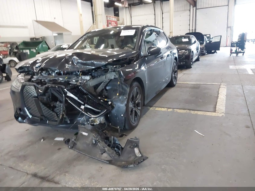 2023 BMW Ix VIN WB523CF03PCM92343 IAAI salvage auction — FRONT END, Salvage (Oregon), sold $18,400 on 2026-07-20 (photo 2)