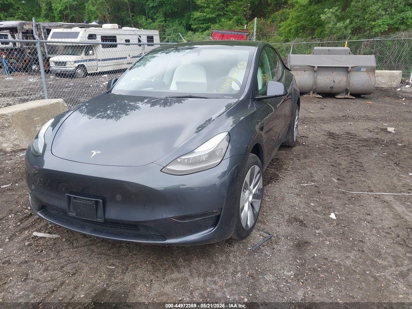 2023 Tesla Model y VIN 7SAYGDEE7PA206602 IAAI salvage auction — REAR END, Salvage (Massachusetts), sold $12,600 on 2026-07-30 (photo 2)
