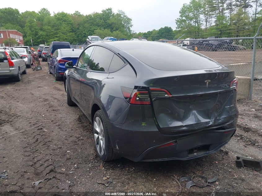 2023 Tesla Model y VIN 7SAYGDEE7PA206602 IAAI salvage auction — REAR END, Salvage (Massachusetts), sold $12,600 on 2026-07-30 (photo 3)