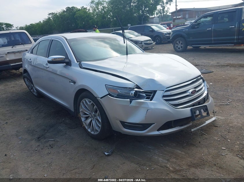2014 Ford Taurus VIN 1FAHP2F81EG113712 IAAI salvage auction — LEFT FRONT, Salvage Title, sold $400 on 2026-07-09 (photo 1)