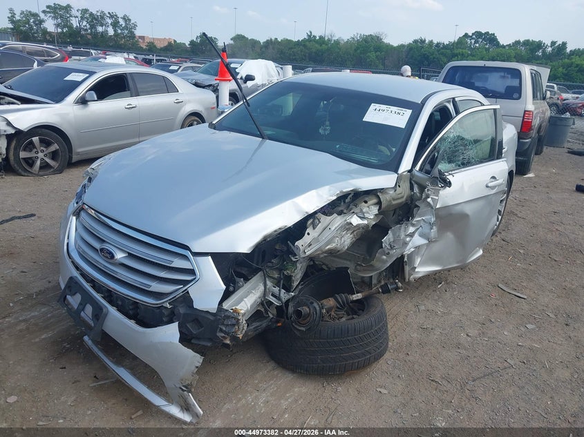 2014 Ford Taurus VIN 1FAHP2F81EG113712 IAAI salvage auction — LEFT FRONT, Salvage Title, sold $400 on 2026-07-09 (photo 2)