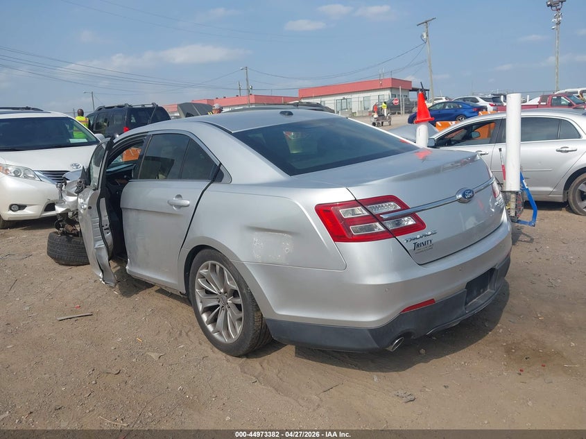 2014 Ford Taurus VIN 1FAHP2F81EG113712 IAAI salvage auction — LEFT FRONT, Salvage Title, sold $400 on 2026-07-09 (photo 3)