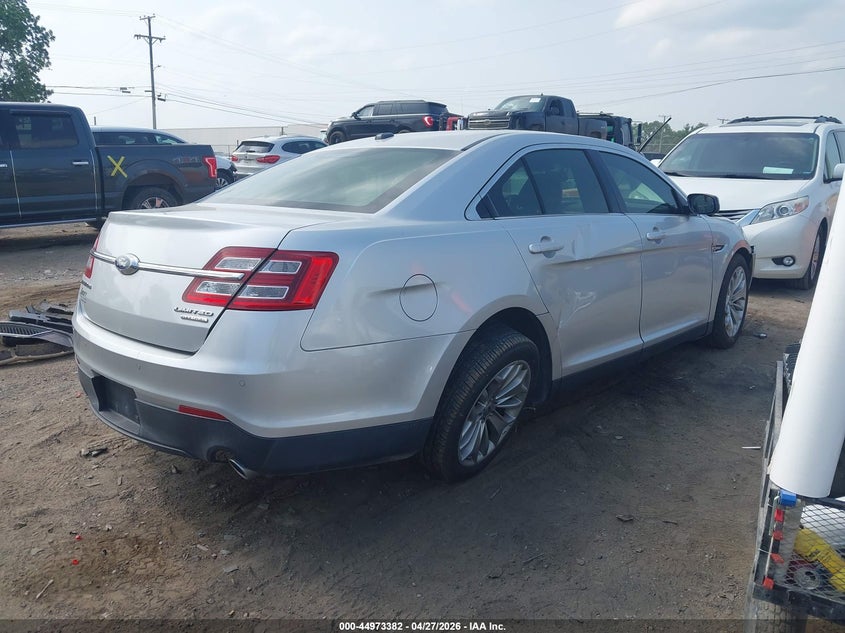 2014 Ford Taurus VIN 1FAHP2F81EG113712 IAAI salvage auction — LEFT FRONT, Salvage Title, sold $400 on 2026-07-09 (photo 4)