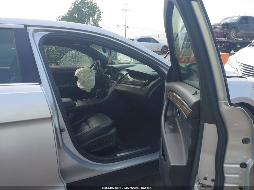 2014 Ford Taurus VIN 1FAHP2F81EG113712 IAAI salvage auction — LEFT FRONT, Salvage Title, sold $400 on 2026-07-09 (photo 5)