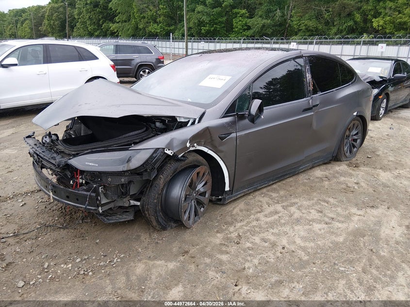 2018 Tesla Model x VIN 5YJXCBE49JF097960 IAAI salvage auction — FRONT & REAR, Salvage (Idaho), sold $3,750 on 2026-07-11 (photo 2)