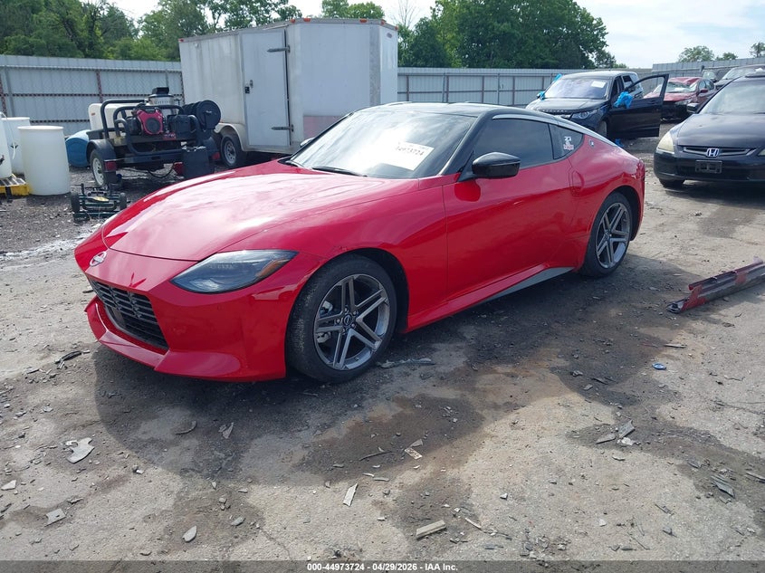 2025 Nissan Z VIN JN1BZ4AH8SM412322 IAAI salvage auction — SIDE, Salvage Title, sold $16,400 on 2026-07-08 (photo 2)