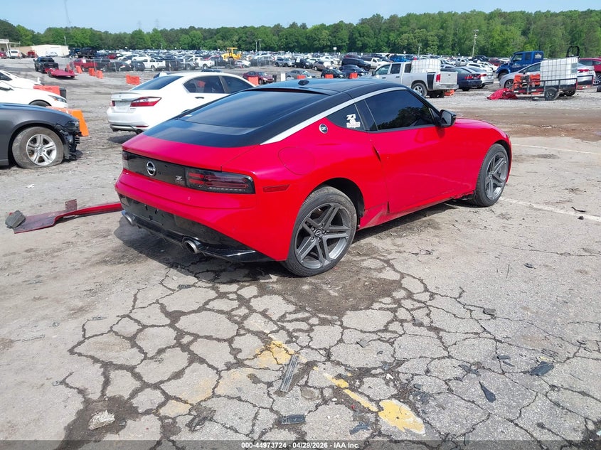 2025 Nissan Z VIN JN1BZ4AH8SM412322 IAAI salvage auction — SIDE, Salvage Title, sold $16,400 on 2026-07-08 (photo 4)